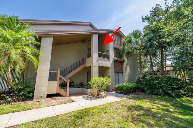 3066 Landmark Blvd Unit 1305, Palm Harbor, FL 34684 - view of property featuring stairs