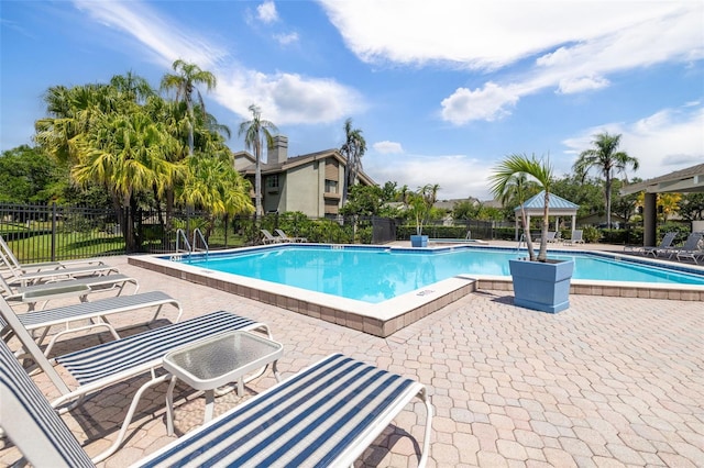 3066 Landmark Blvd Unit 1305, Palm Harbor, FL 34684 - community pool with a patio and a gazebo
