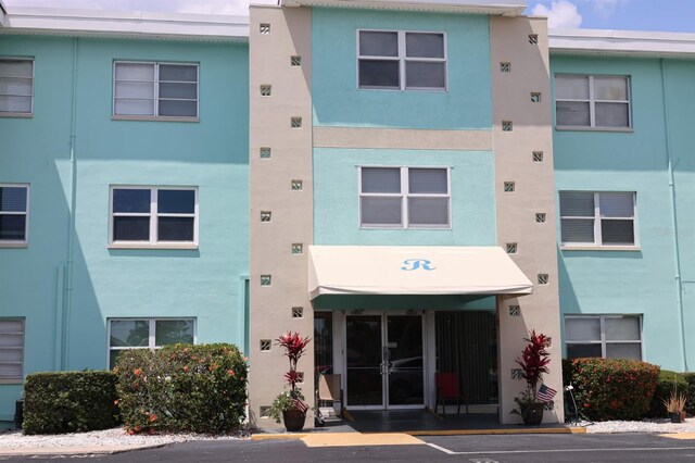 11447 Park Blvd Unit 301, Seminole, FL 33772 - view of property with uncovered parking