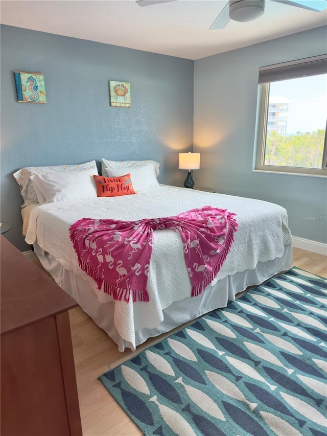 bedroom with wood finished floors