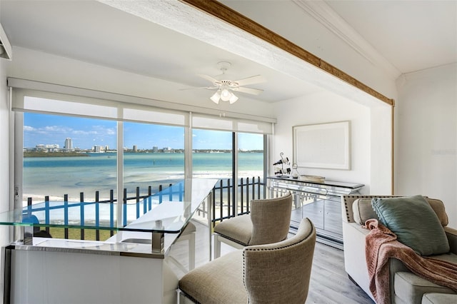 sunroom with a water view