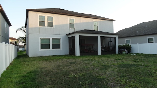 11704 Navajo Sandstone St, Riverview, FL 33579 - back of property featuring a sunroom and stucco siding