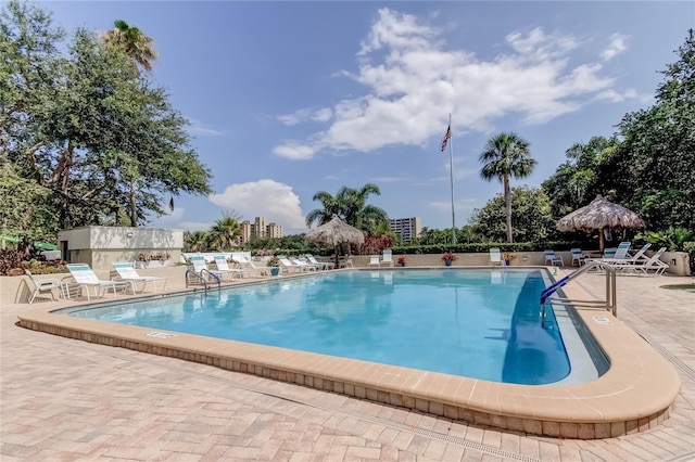 community pool with a patio