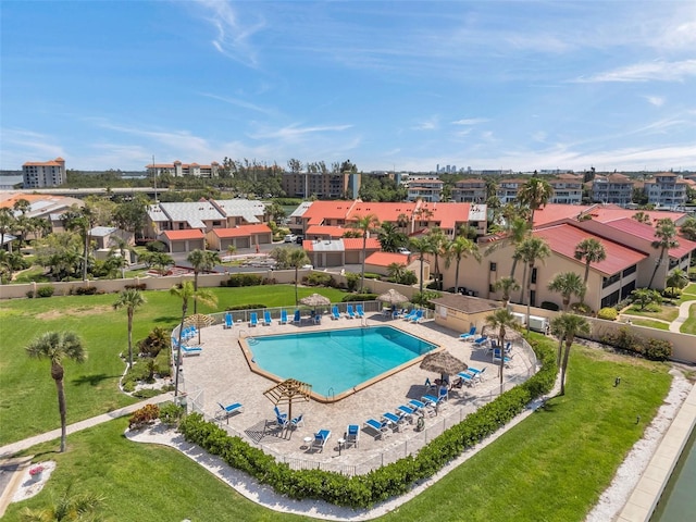 4900 Brittany Dr S Unit 805, Saint Petersburg, FL 33715 - community pool featuring a lawn and a patio area