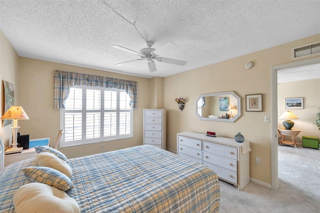 4900 Brittany Dr S Unit 805, Saint Petersburg, FL 33715 - bedroom featuring light carpet, a ceiling fan, and a textured ceiling