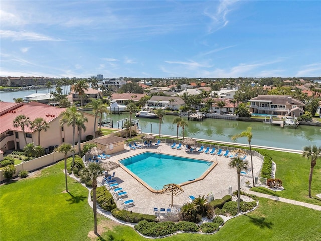 4900 Brittany Dr S Unit 805, Saint Petersburg, FL 33715 - community pool featuring a water view, a residential view, and a patio