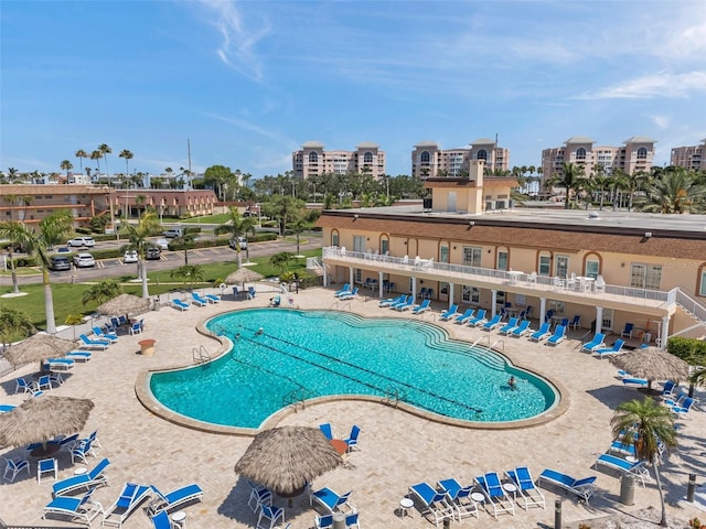 4900 Brittany Dr S Unit 805, Saint Petersburg, FL 33715 - community pool featuring a patio area and a city view