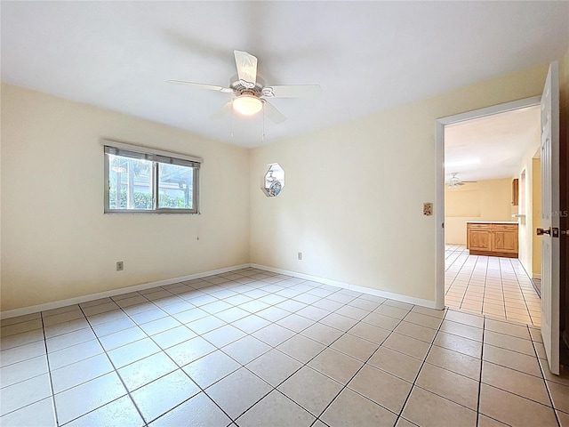 232 Pinecrest Dr, Palm Harbor, FL 34683 - spare room with ceiling fan and light tile patterned flooring