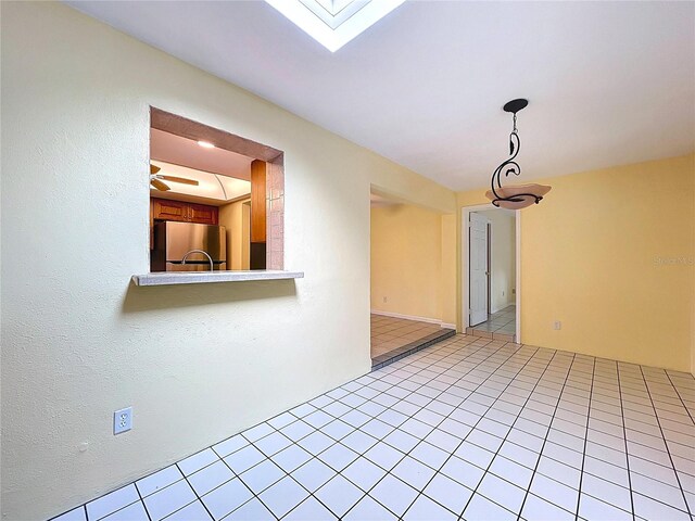 232 Pinecrest Dr, Palm Harbor, FL 34683 - empty room with light tile patterned floors