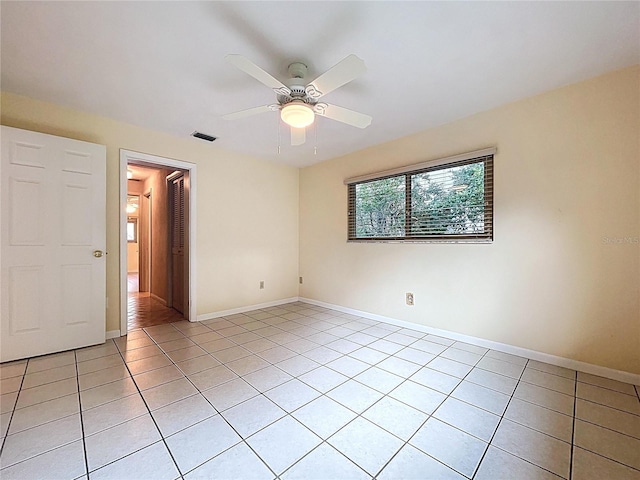 232 Pinecrest Dr, Palm Harbor, FL 34683 - unfurnished room with light tile patterned floors and a ceiling fan