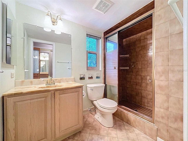232 Pinecrest Dr, Palm Harbor, FL 34683 - bathroom featuring tile patterned floors, vanity, and a stall shower