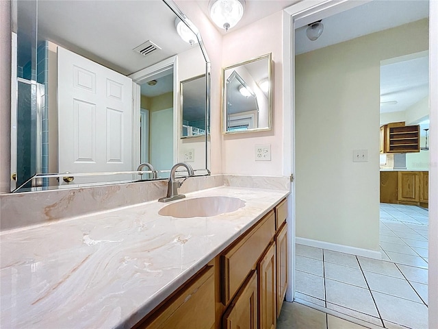 232 Pinecrest Dr, Palm Harbor, FL 34683 - full bathroom featuring tile patterned flooring, vanity, and a shower with door