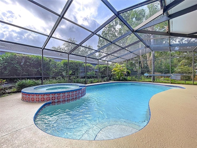 232 Pinecrest Dr, Palm Harbor, FL 34683 - view of swimming pool with a pool with connected hot tub, a lanai, and a patio area