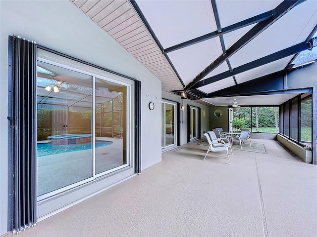 232 Pinecrest Dr, Palm Harbor, FL 34683 - sunroom with ceiling fan and a hot tub