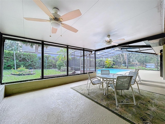 232 Pinecrest Dr, Palm Harbor, FL 34683 - sunroom featuring a ceiling fan