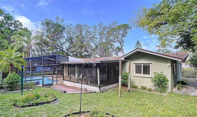 232 Pinecrest Dr, Palm Harbor, FL 34683 - rear view of property featuring an outdoor pool, a yard, stucco siding, a lanai, and a sunroom