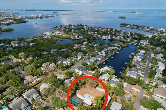 232 Pinecrest Dr, Palm Harbor, FL 34683 - aerial overview of property's location with a nearby body of water and nearby suburban area