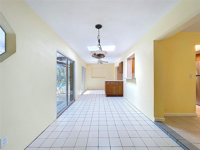 232 Pinecrest Dr, Palm Harbor, FL 34683 - hall with light tile patterned floors