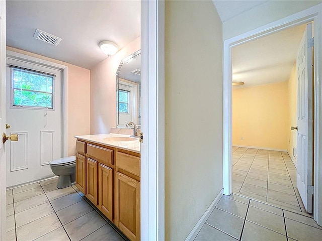 232 Pinecrest Dr, Palm Harbor, FL 34683 - bathroom with tile patterned flooring and vanity
