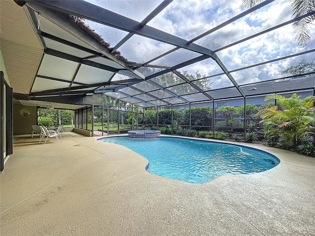 232 Pinecrest Dr, Palm Harbor, FL 34683 - view of swimming pool featuring a patio, a pool with connected hot tub, and a lanai