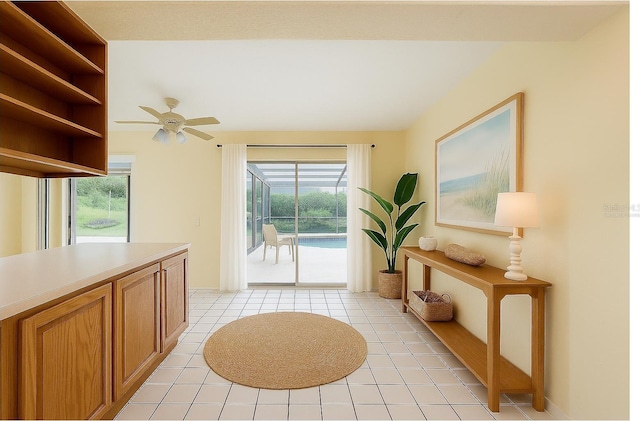 232 Pinecrest Dr, Palm Harbor, FL 34683 - interior space with ceiling fan and light tile patterned flooring