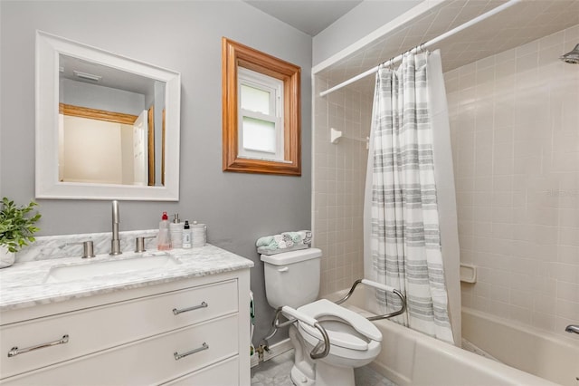 full bathroom with toilet, vanity, and shower / bath combo with shower curtain