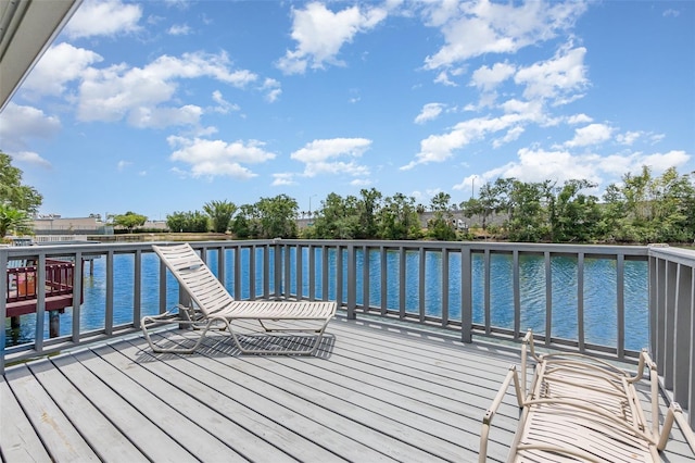 wooden terrace with a water view