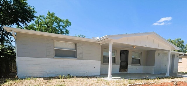 5122 Dove Dr, New Port Richey, FL 34652 - single story home featuring a carport and board and batten siding