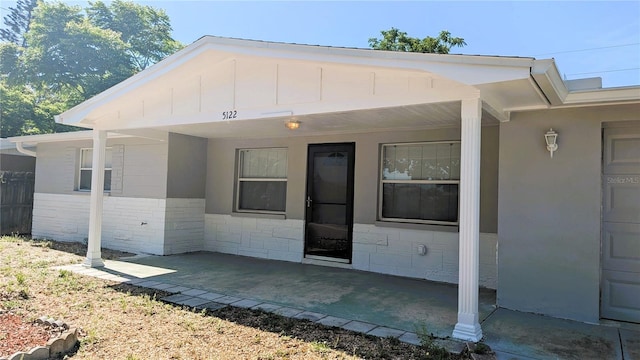 5122 Dove Dr, New Port Richey, FL 34652 - exterior space with a patio area