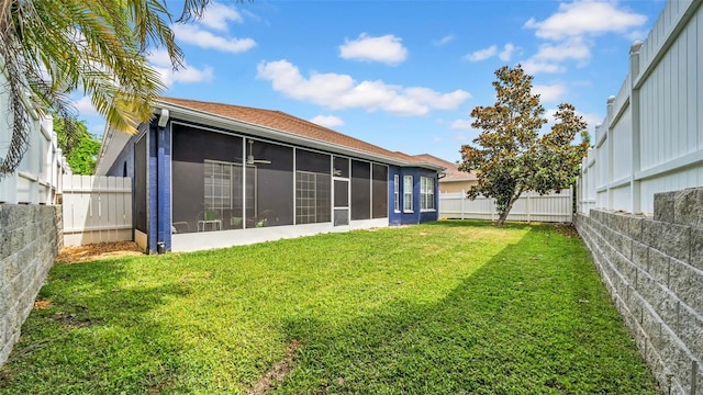 back of property featuring a sunroom