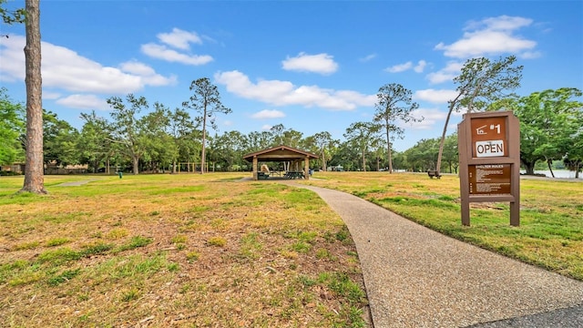 view of community featuring a yard and a gazebo