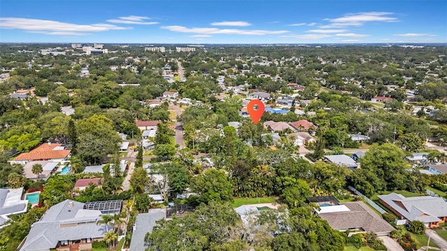 aerial view of property's location with nearby suburban area
