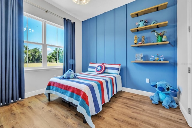 14902 Sweat Loop Rd, Wimauma, FL 33598 - bedroom featuring light wood finished floors and baseboards