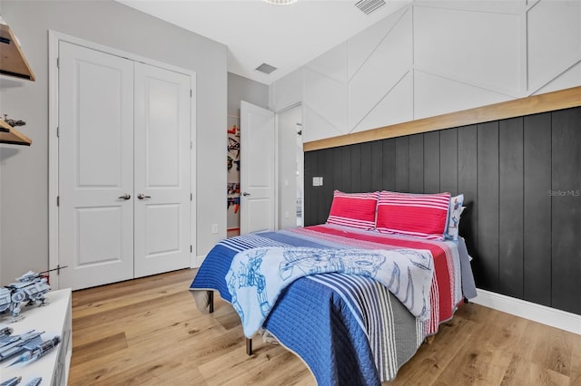 14902 Sweat Loop Rd, Wimauma, FL 33598 - bedroom with wood finished floors and a closet