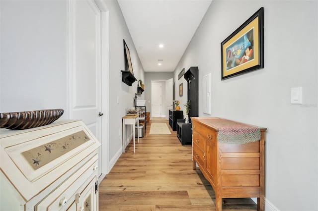 14902 Sweat Loop Rd, Wimauma, FL 33598 - hallway featuring light wood-style floors, recessed lighting, and baseboards