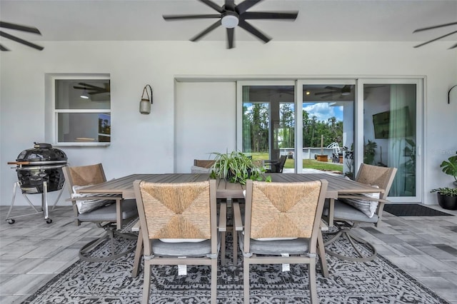 14902 Sweat Loop Rd, Wimauma, FL 33598 - view of patio featuring ceiling fan and outdoor dining area