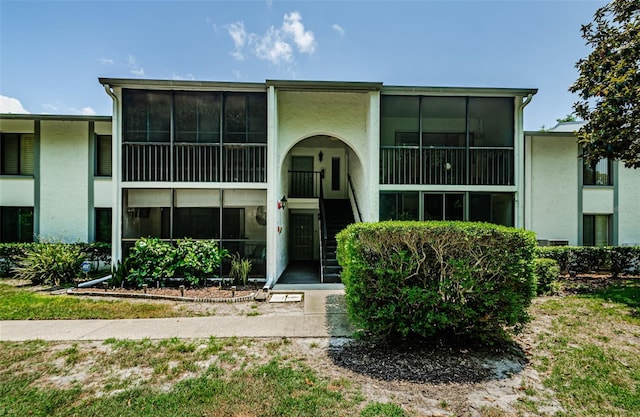 1290 Pine Ridge Cir E Unit G1, Tarpon Springs, FL 34688 - view of property with stairway