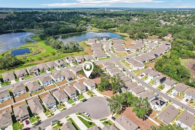 aerial view featuring a water view and a residential view
