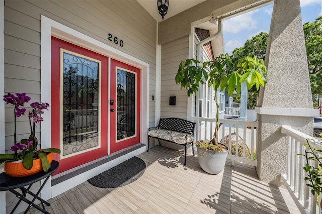 260 SW Lincoln Cir N, Saint Petersburg, FL 33703 - property entrance featuring french doors and covered porch
