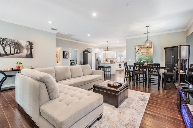 260 SW Lincoln Cir N, Saint Petersburg, FL 33703 - living area featuring dark wood finished floors, recessed lighting, and ornamental molding