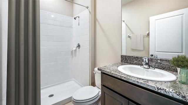 10669 Bridgegate Heights Loop, San Antonio, FL 33576 - full bathroom featuring vanity, toilet, and a shower stall