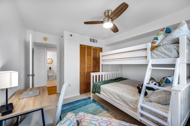 bedroom featuring a closet and visible vents