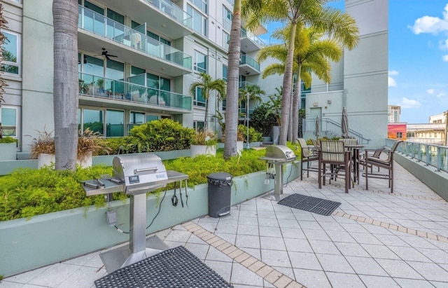 view of patio with outdoor dining space and area for grilling