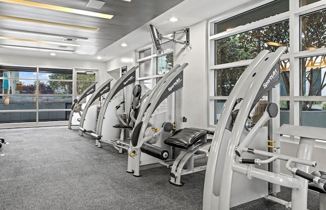 workout area with recessed lighting