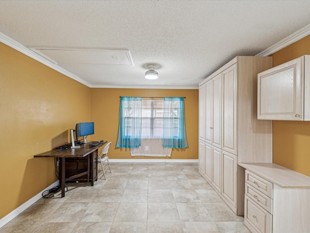 office featuring crown molding, a textured ceiling, attic access, and baseboards