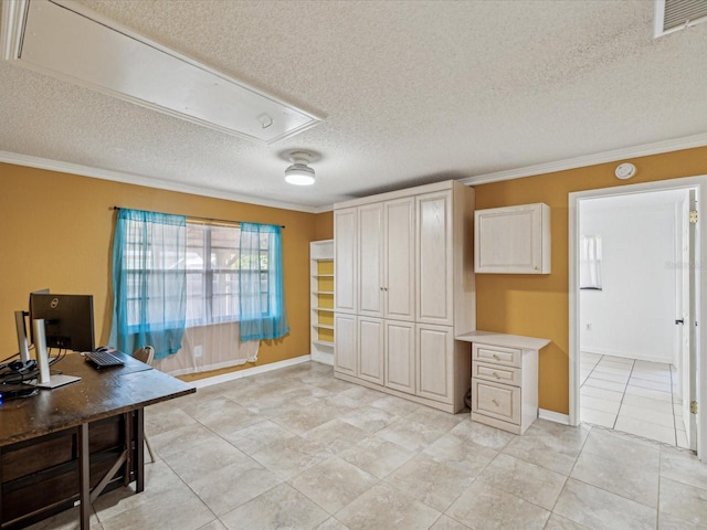 unfurnished office featuring crown molding, attic access, visible vents, and a textured ceiling