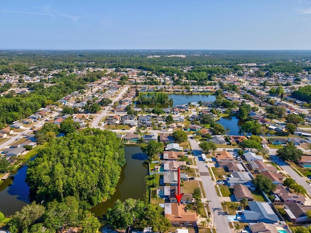 aerial view featuring a water view and a residential view