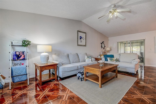 living room with vaulted ceiling, a textured ceiling, a ceiling fan, and baseboards