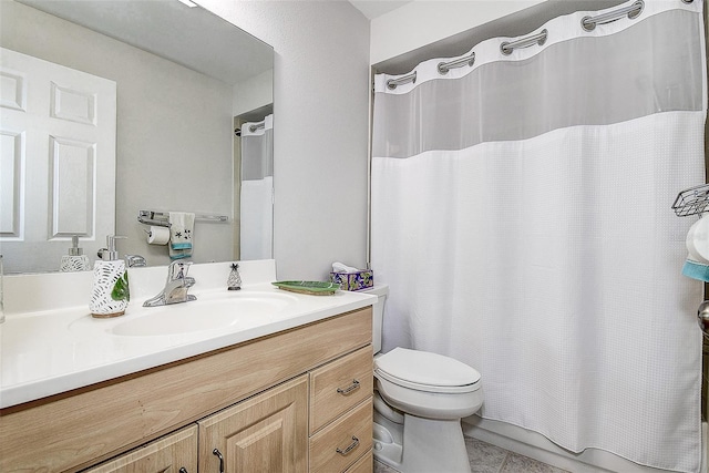 full bathroom with toilet, vanity, tile patterned flooring, and a shower with shower curtain
