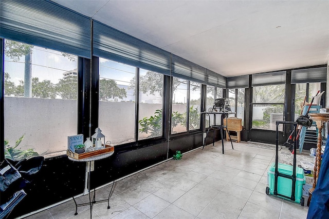 sunroom with tile patterned flooring